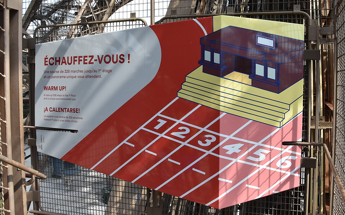 tour Eiffel panneau échauffez-vous